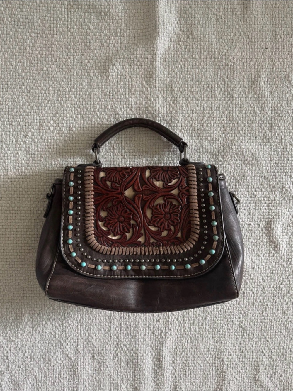 Brown Leather Shoulder Bag with Carved Floral Panel and Turquoise Studs